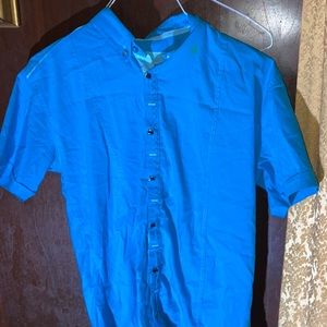 Unique vintage 90s turquoise blouse.
